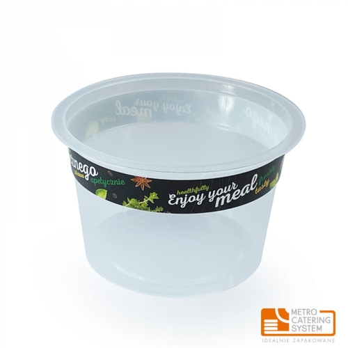 Pojemnik do zgrzewu 500 ml, przezroczysta miska EcoLine z czarną etykietą z zielonymi napisami Enjoy your meal oraz dekoracyjnymi wzorami. Produkt stojący, o okrągłym kształcie, idealny do serwowania potraw.