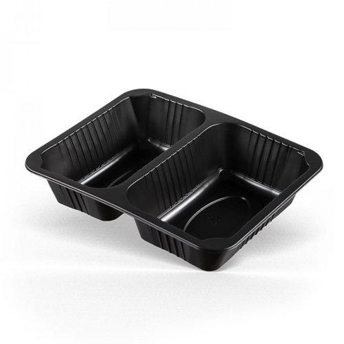 Czarny pojemnik do zgrzewu METROOLINE o wymiarach 227x178x60 mm, podzielony na dwie komory, z wyraźnymi rowkami na bokach. Przeznaczony do pakowania żywności, prezentowany w pozycji leżącej na białym tle. Opakowanie zawiera 320 sztuk.