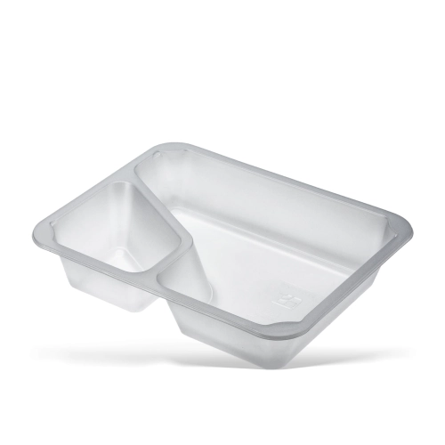 Pojemnik do zgrzewu CORNER TRANSPARENT w kolorze przezroczystym, o wymiarach 227x178x60 mm, z dwoma komorami. Ułożony w pozycji leżącej, z widoczną dużą komorą oraz mniejszą, trójkątną. Idealny do pakowania żywności.